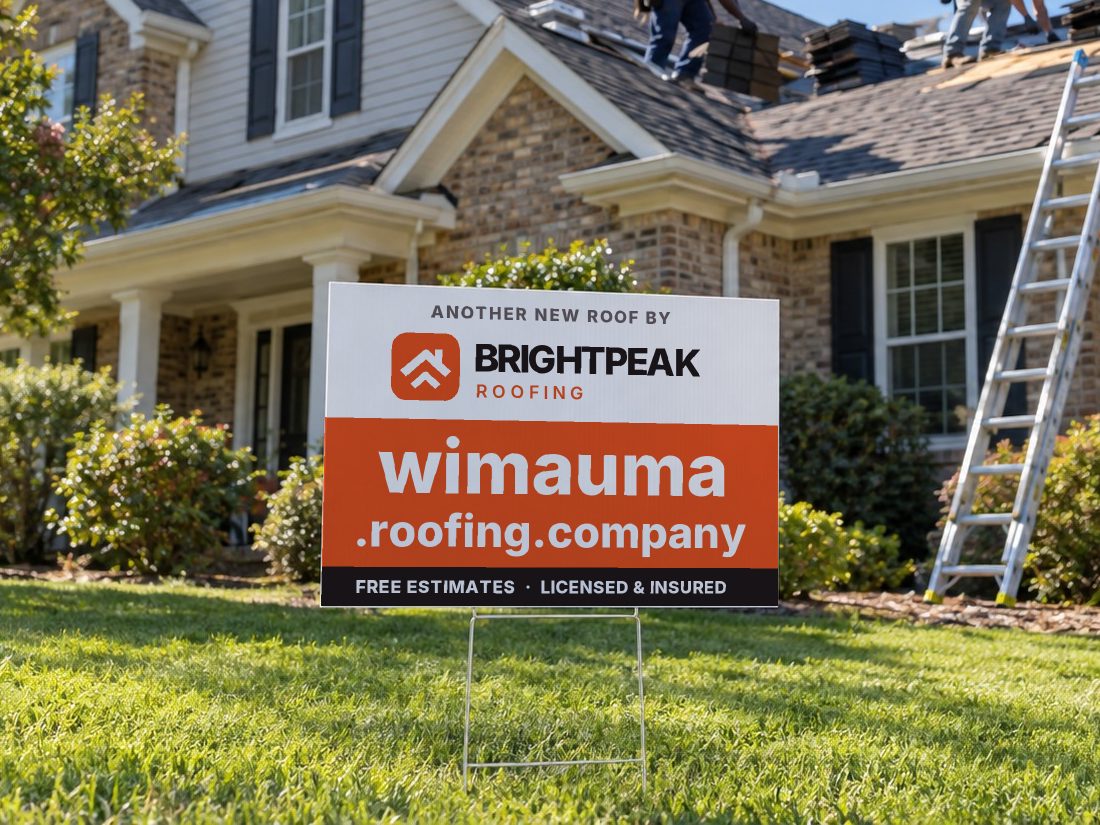 wimauma.roofing.company on a yard sign in front of a house getting a new roof